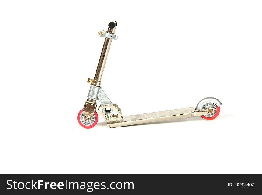 Iron scooter with pink wheels isolated on a white background