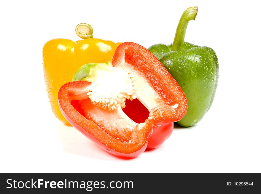 Fresh colored paprika isolated on a white background