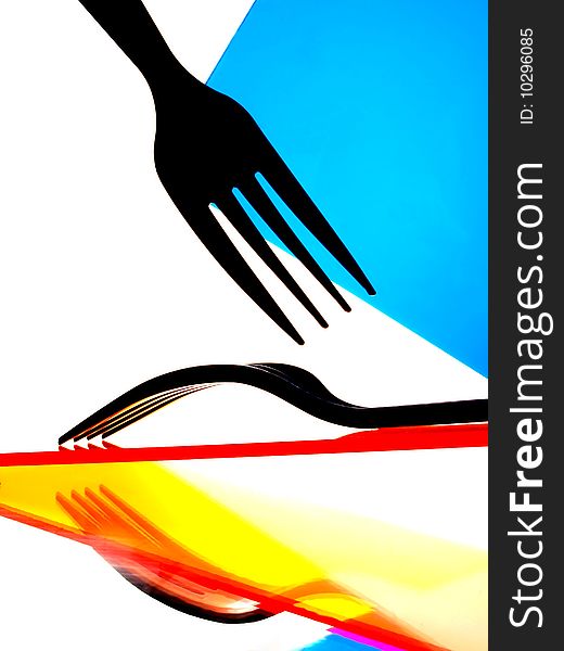 Abstract background design of fork and reflections with numerous colors. Abstract background design of fork and reflections with numerous colors.