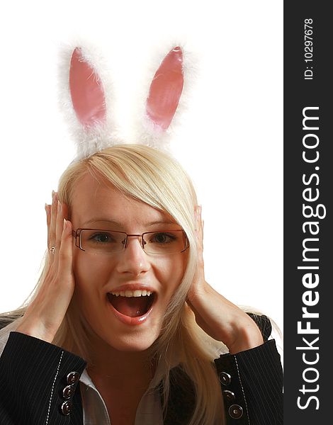 A young attractive business woman with bunny ears, isolated on white background