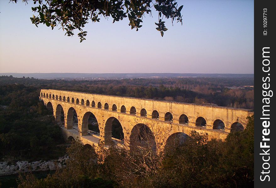 The Pont du Gard is an aqueduct in the South of France constructed by the Roman Empire, and located in Vers-Pont-du-Gard near Remoulins, in the Gard dÃ©partement.