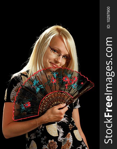 A Young Attractive Woman With Fan