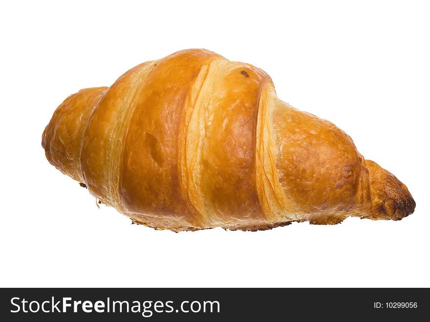 The croissant (close-up, on white background