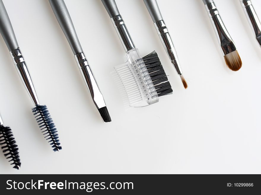 Cosmetic brushes isolated on white background