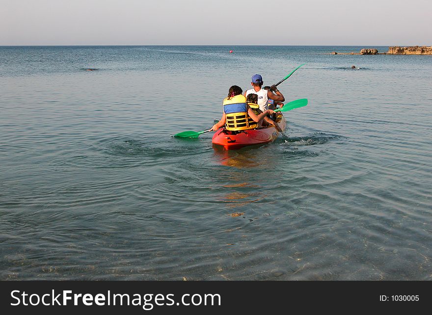 People in canoe at protaras area in cyprus