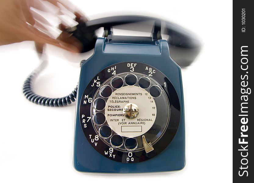 Old retro blue bakelite phone with hand holding receiver. Old retro blue bakelite phone with hand holding receiver