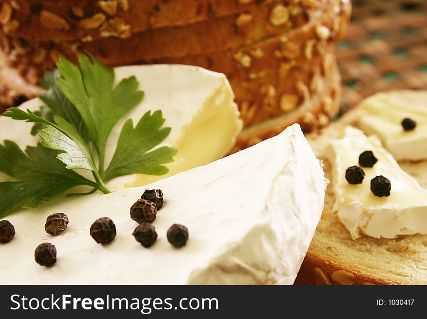 Bread and cheese on wooden board. Bread and cheese on wooden board