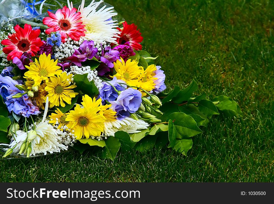 Bouquet of flowers on grass. Bouquet of flowers on grass.