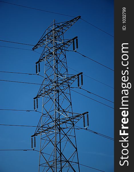 Electricity pylon with blue background. Electricity pylon with blue background.