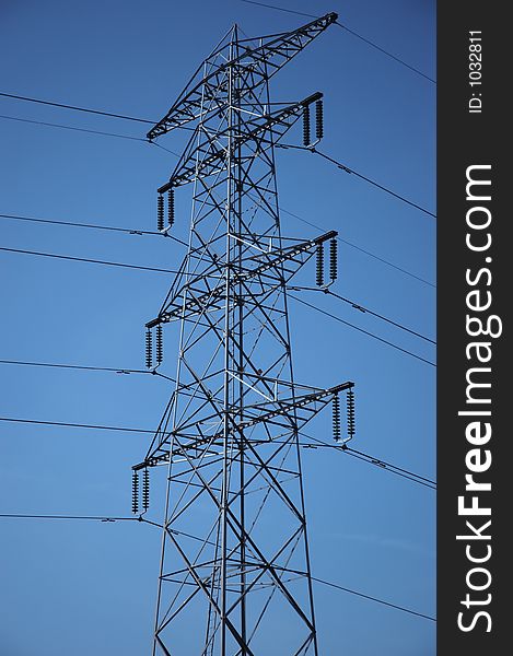 Electricity pylon with blue background. Electricity pylon with blue background.