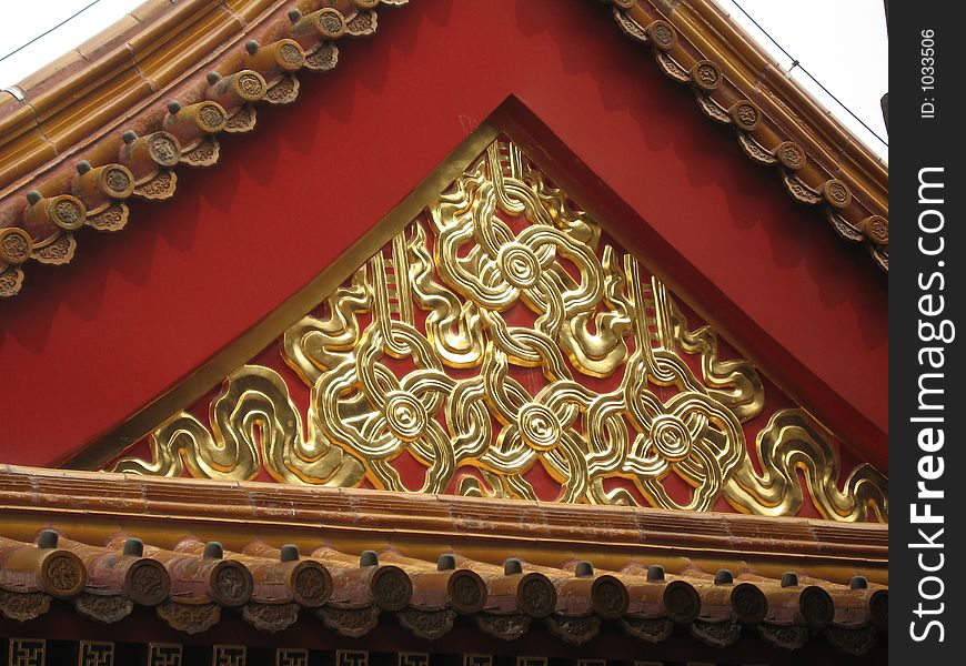 Architerctural detail in the Forbidden City in Beijing, handpainted elements of one of the temples