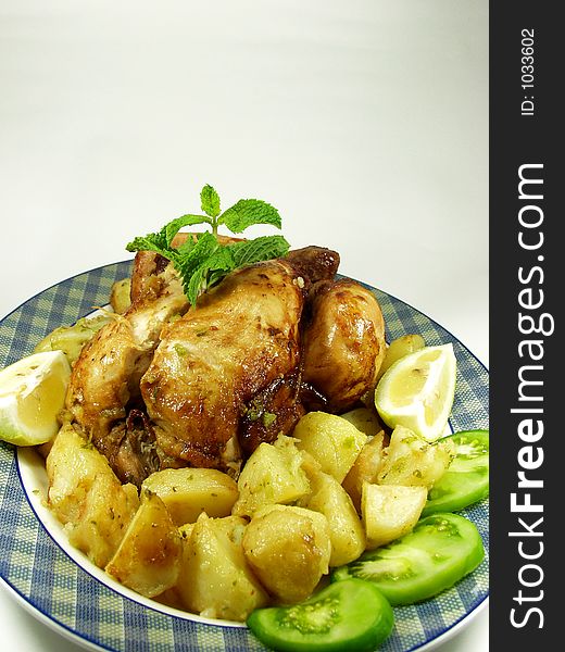 Roast chicken whit potatoes and salad