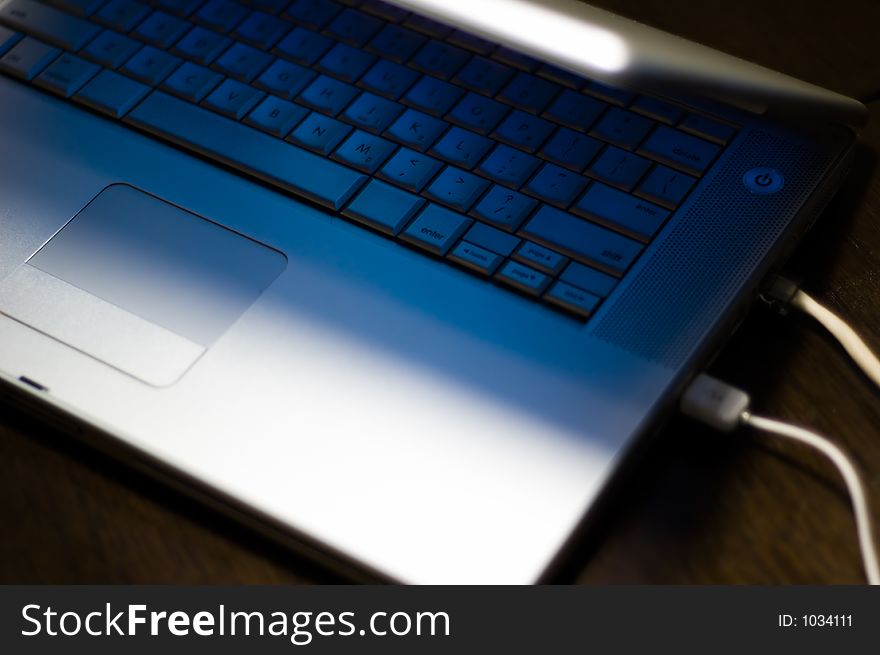 Laptop Keyboard with blue light from lcd