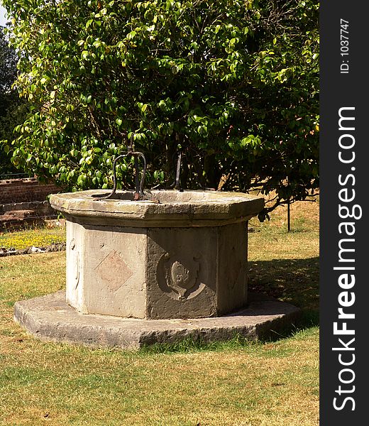 Old stone octagonal Tudor well