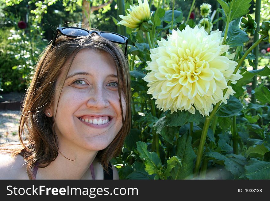 Attractive Woman next to Flower