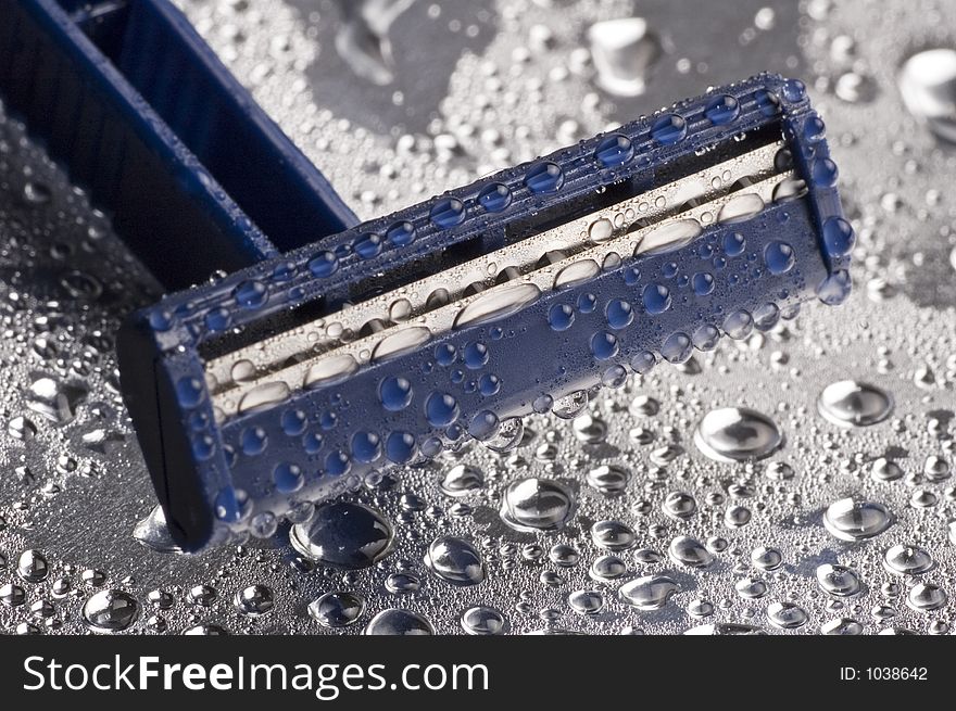 Isolated Razor And Water