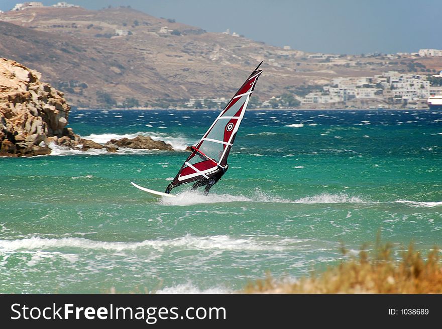 Windsurfer on rough seas in Milos Greece