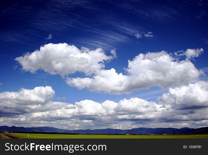 Image of a blue sky and clouds over the Prairie