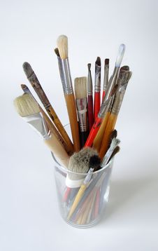 Paint Brushes In Glass Container Stock Photo
