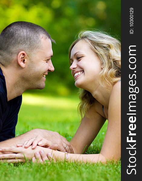 Caucasian couple together on meadow at a summer day. Caucasian couple together on meadow at a summer day