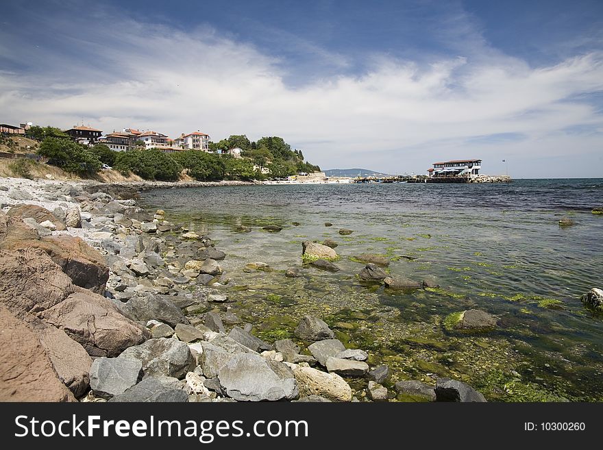 rock the Black Sea coast and the blue sky with clouds. rock the Black Sea coast and the blue sky with clouds