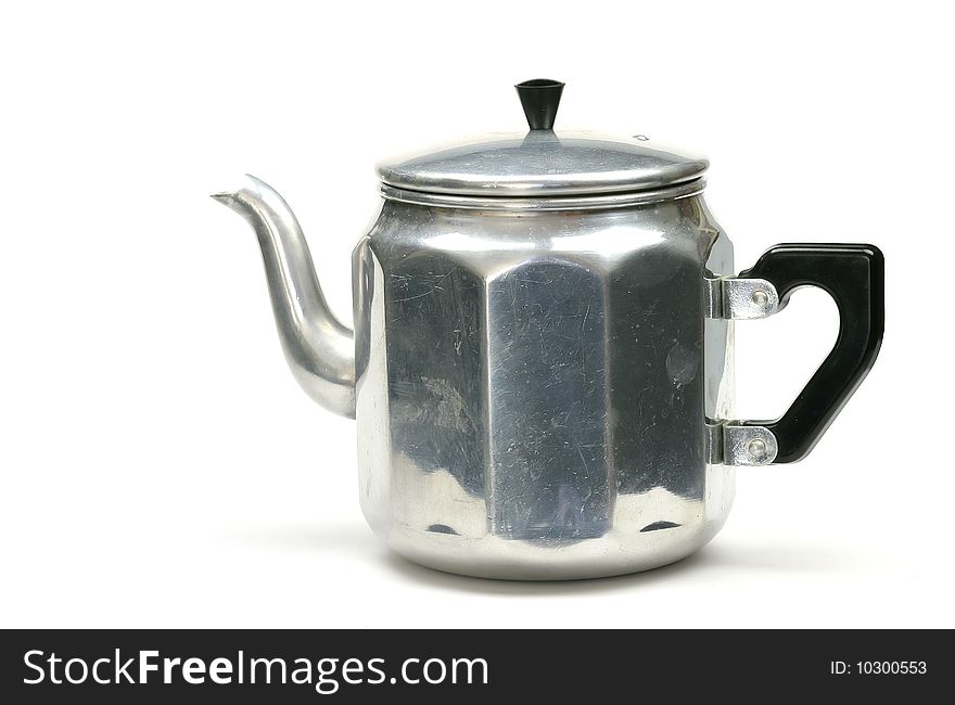 Classic Dutch teapot with black handle and white background