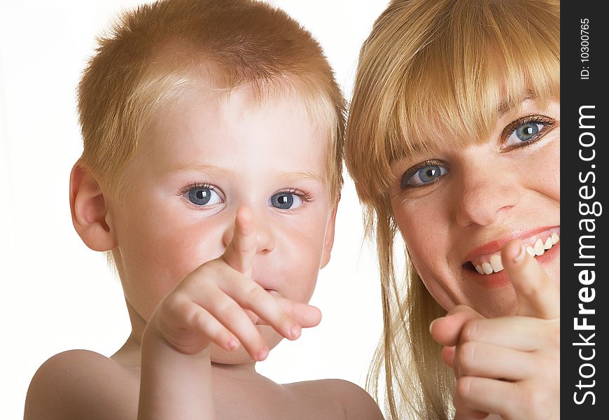 Young mum with the small son on a white background. Young mum with the small son on a white background