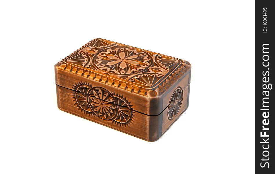 Closed carved wooden casket isolated