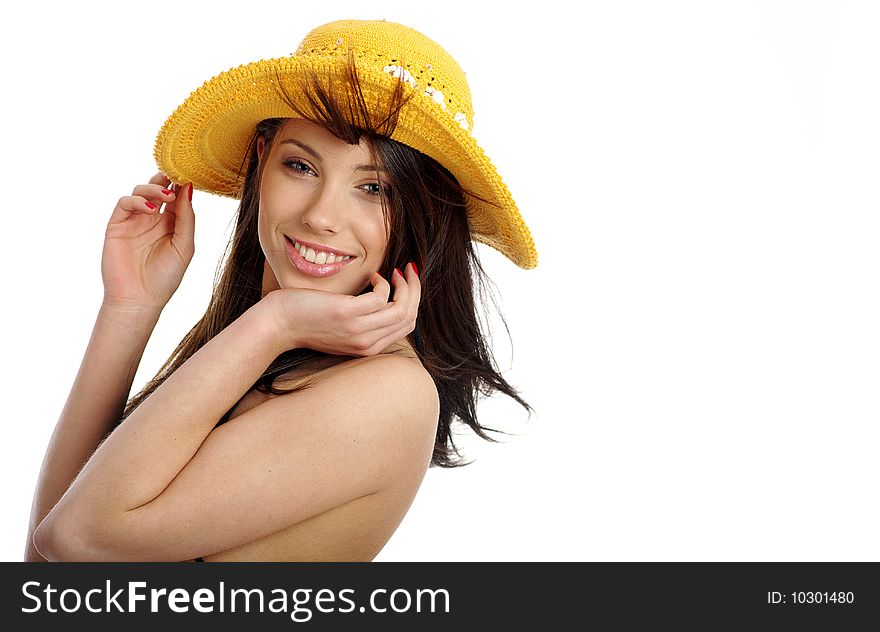 Beautiful summer woman in yellow hat and bikini