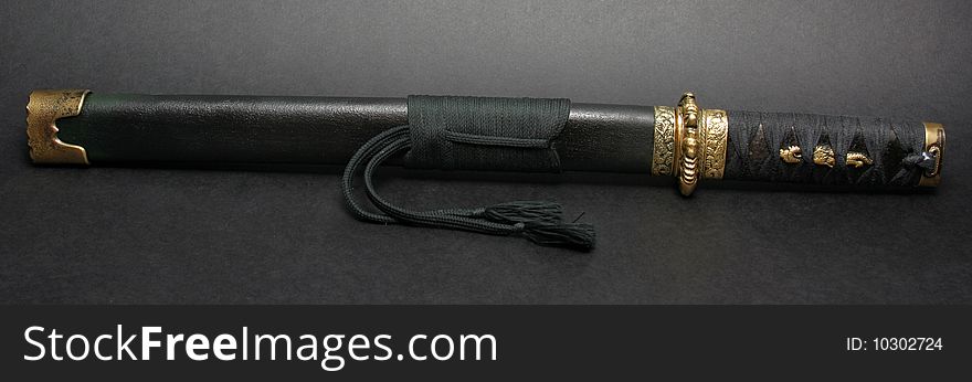 The wakizashi  is a traditional Japanese sword with a blade between 30 and 60 cm (12 and 24 inches), with an average of 50 cm (20 inches). It is similar to but shorter than a katana, and usually shorter than the kodachi (small sword). The wakizashi was usually worn together with the katana by the samurai or swordsmen of feudal Japan.