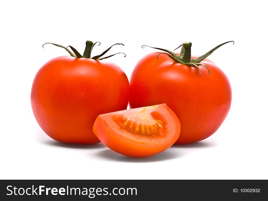 Fresh tomatoes. Macro studio isolated on white.