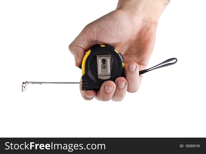 A hand holding a tape measure on white backround