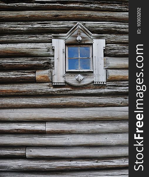 Window in old wooden house, Russia North. Can be used like wooden texture. Window in old wooden house, Russia North. Can be used like wooden texture.