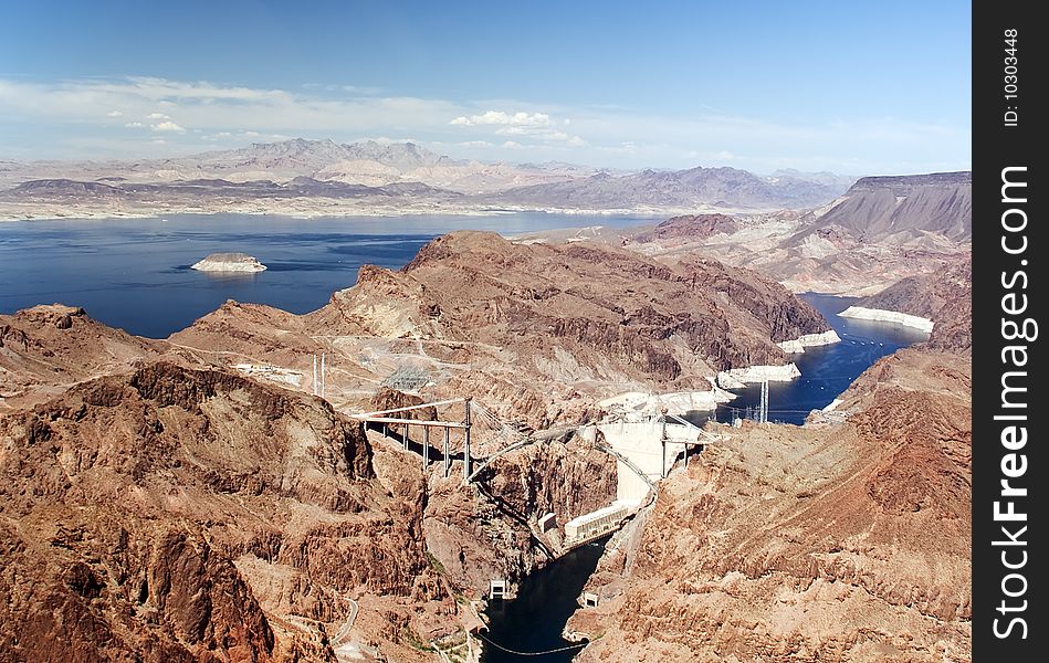 Aerial shot of the Hoover Dam. Glen Canyon Dam on the Colorado River and Lake Powell. Nevada, USA. Famous landmark. Aerial shot of the Hoover Dam. Glen Canyon Dam on the Colorado River and Lake Powell. Nevada, USA. Famous landmark.