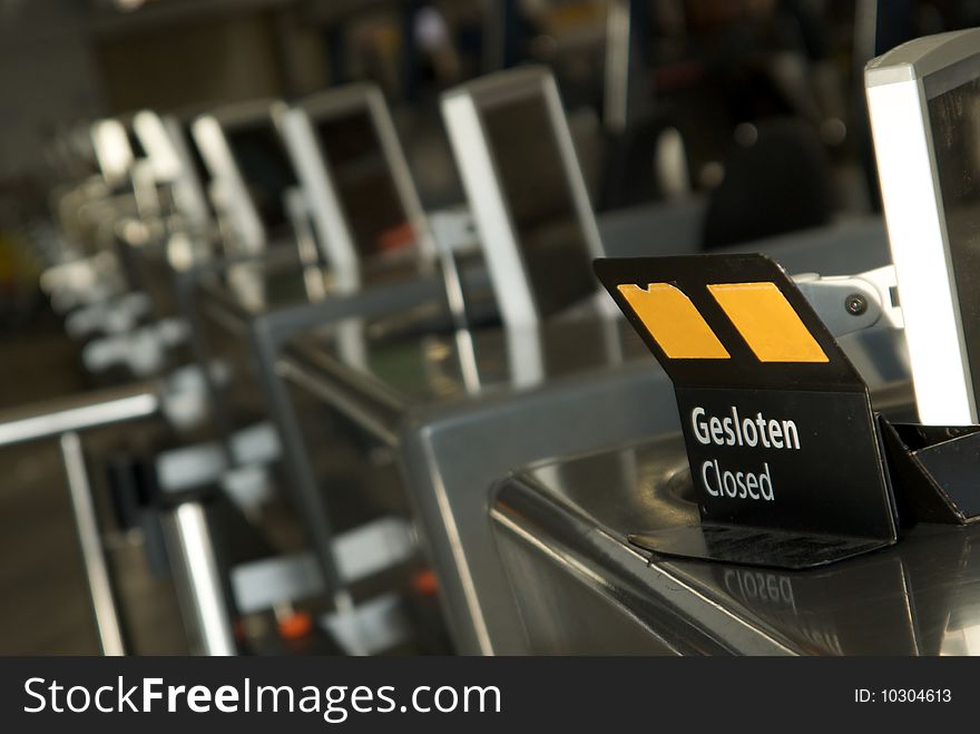 Row of closed airport check inÂ´s. Row of closed airport check inÂ´s.