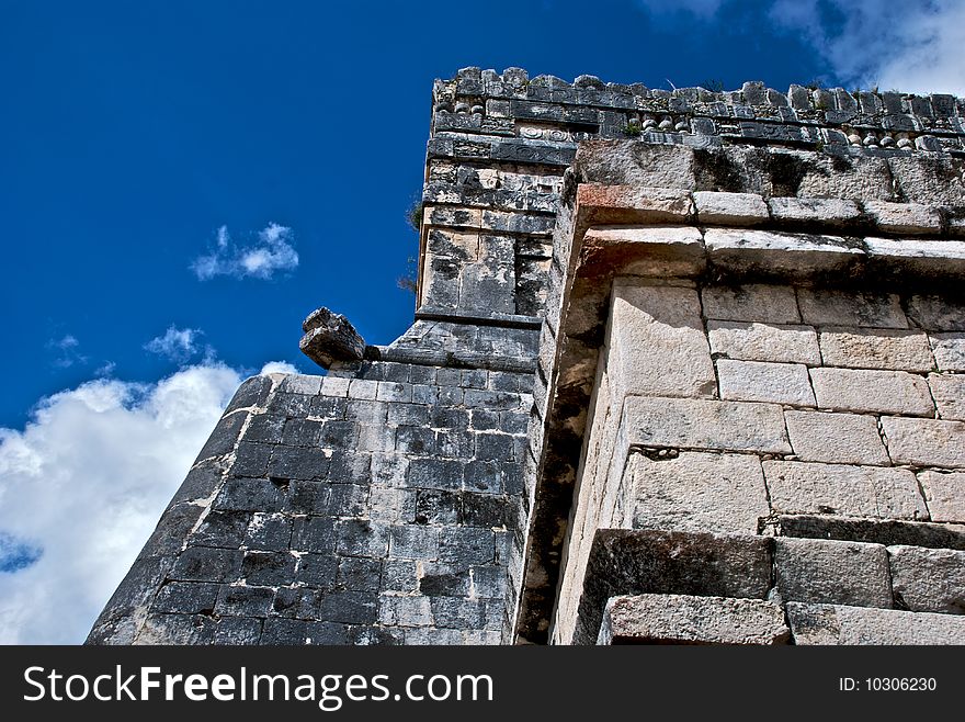 Corner of a small pyramid at Chchen Itza Mexico. Corner of a small pyramid at Chchen Itza Mexico