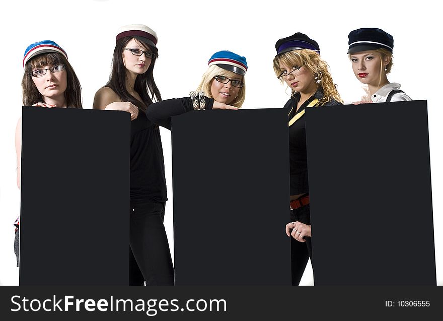 Team of five young women in generic university caps holding three blank posters. Team of five young women in generic university caps holding three blank posters.