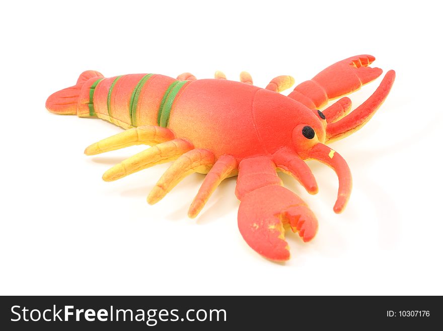 A lobster toy on a white background.