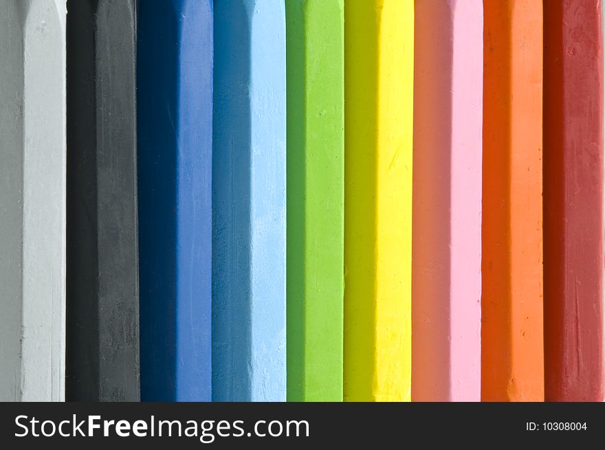 Abstract background of oil pastels, rainbow plus black and gray. Abstract background of oil pastels, rainbow plus black and gray.