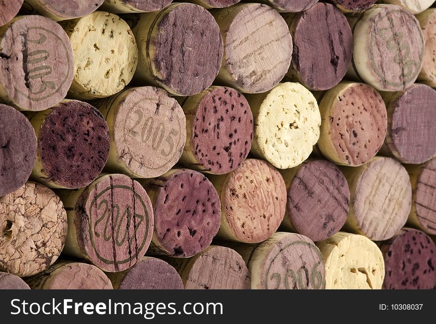 Stack of wine corks, focus on left side, right side recedes. Stack of wine corks, focus on left side, right side recedes.