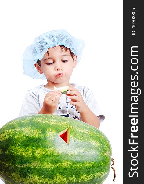 A beautiful Kid eating water melon. A beautiful Kid eating water melon