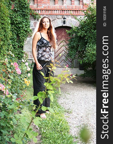 Beautiful young woman in garden. Beautiful young woman in garden