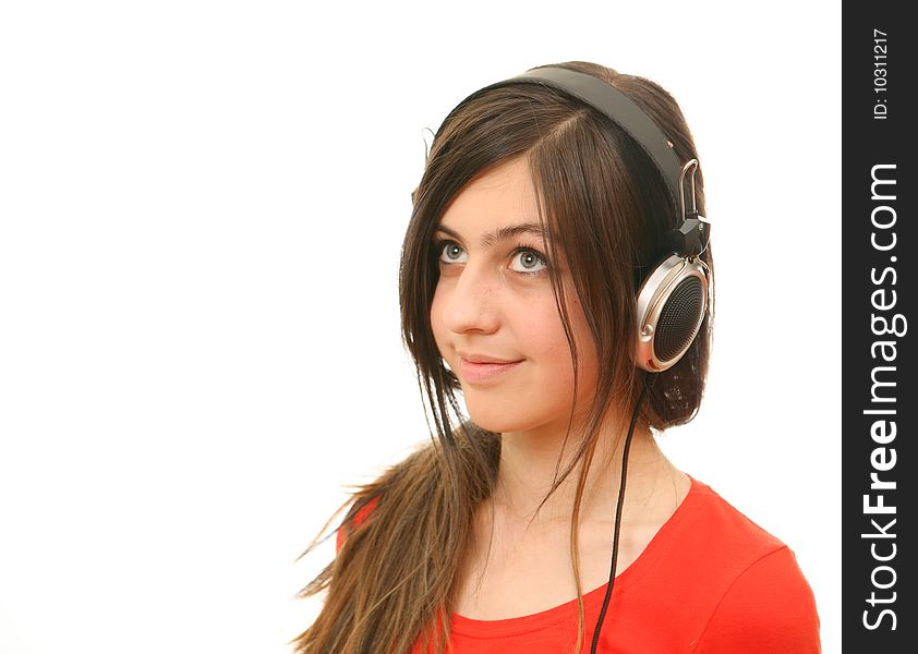 The girl in headphones on a white background