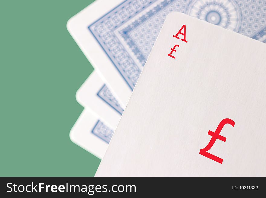 Closeup of playing cards showing Ace of Pounds. Closeup of playing cards showing Ace of Pounds