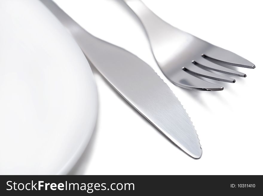 Fork and knife isolated over white