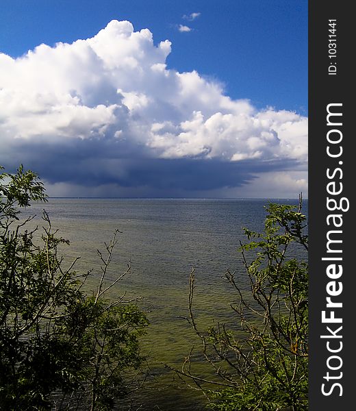 The Baltic Sea seen from the coast located north of Tallinn, Estonia, with a storm approaching in the background. The Baltic Sea seen from the coast located north of Tallinn, Estonia, with a storm approaching in the background