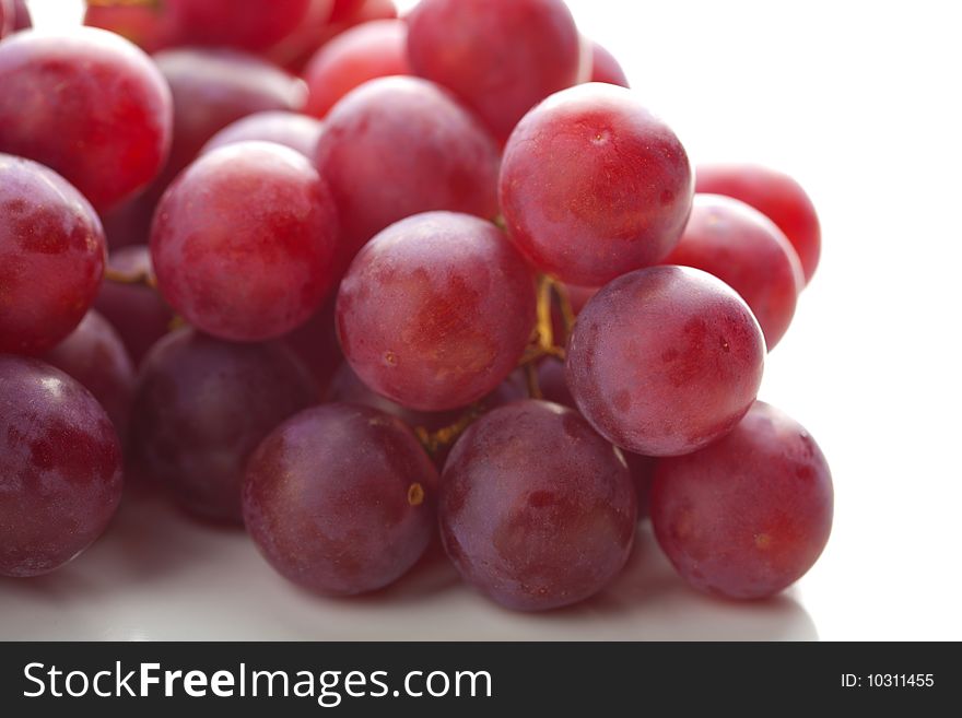 Ripe grapes isolated over white