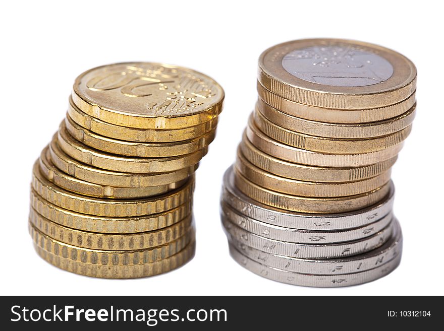 Two stacks of coins isolated over white