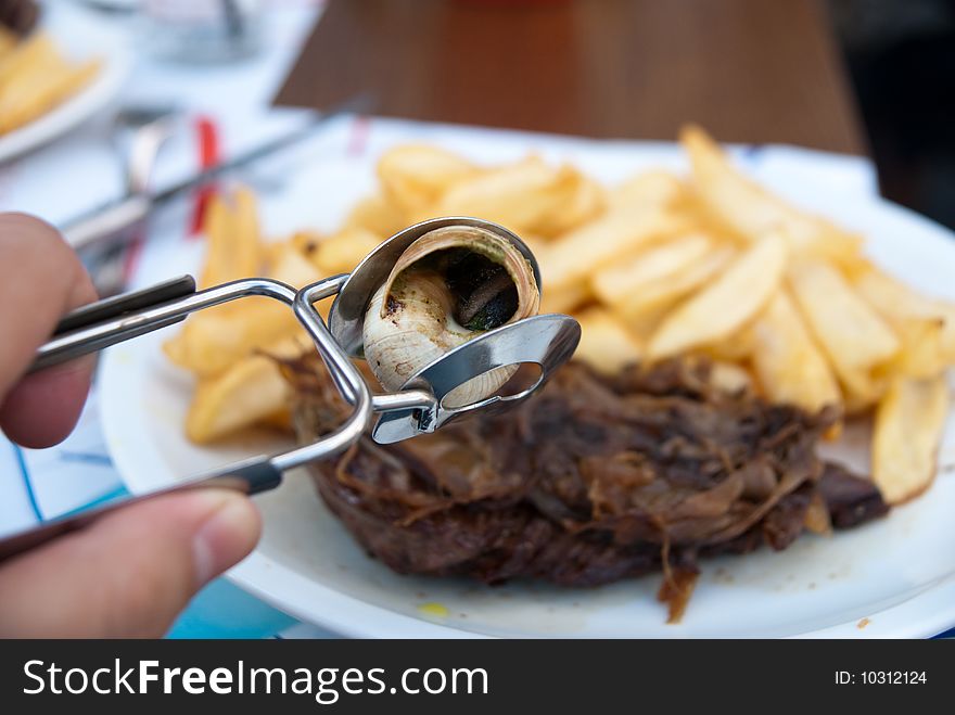 Frencn meal with beef and golden potato fries. Frencn meal with beef and golden potato fries