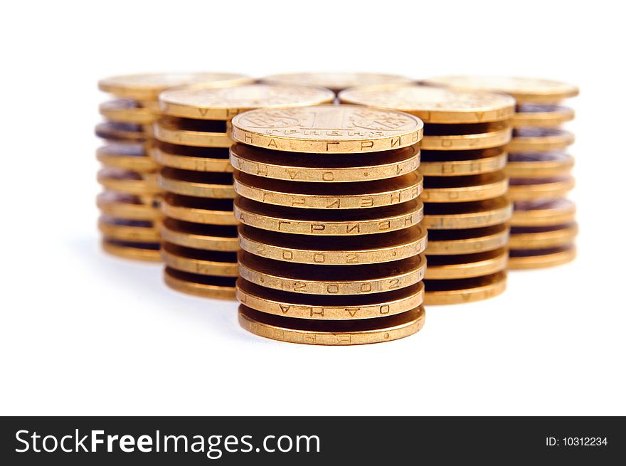 Triangle from the coins isolated on white. Triangle from the coins isolated on white